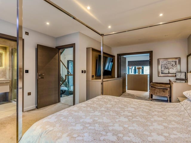 One of the spacious bedrooms, all of which have mini-fridges built in to wardrobes.