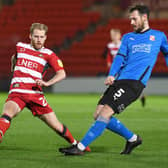 Josh Sims in action against Swindon Town