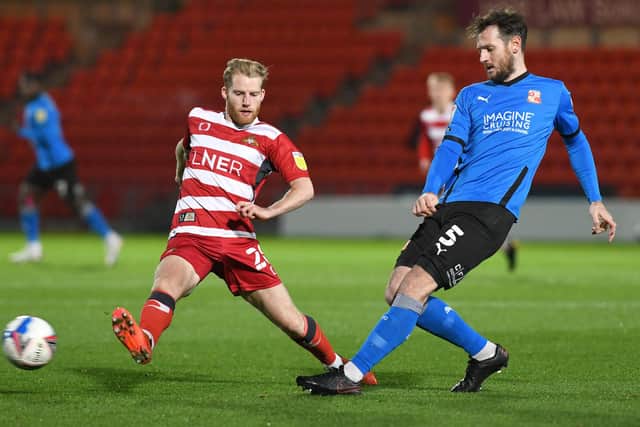 Josh Sims in action against Swindon Town