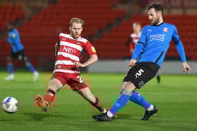 Josh Sims in action against Swindon Town