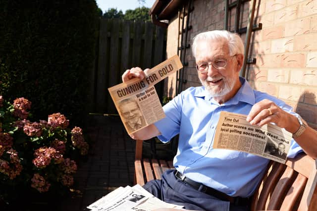 Doncaster Author David Horncastle, pictured with some old press cuttings from when he featured in print before. Pictured: Marie Caley NDFP-22-09-20-Horncastle 4-NMSY