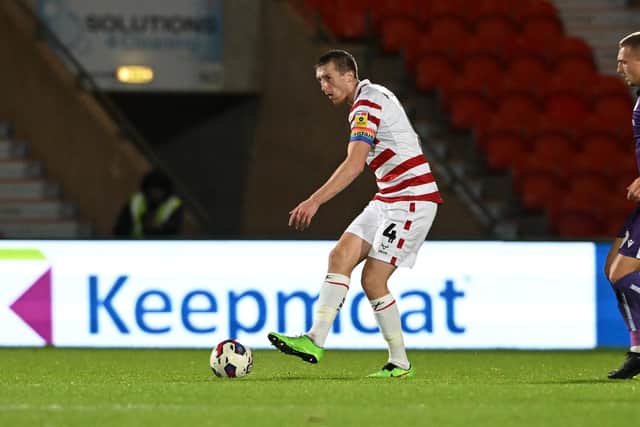 On the ball: Doncaster Rovers defender Tom Anderson.