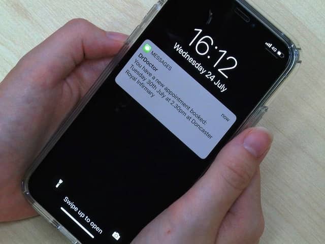 A patient receiving their appointment via a text messaging service.
