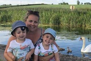 Madi Mace and her two children.