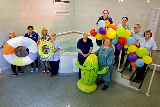 ChAD Vice-Chair Raymond Humphries (front, second right) and ChAD Participation Lead Karen Senior (front right) are pictured with RDaSH and You Hearts and Minds staff at the launch of the Therapy Pool Fundraising Campaign.