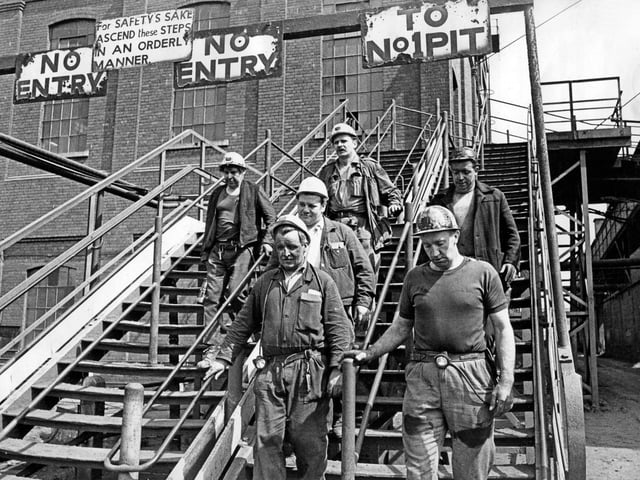 It's the end of the shift for these Hatfield Colliery miners as they are pictured leaving the pit head in May 1971