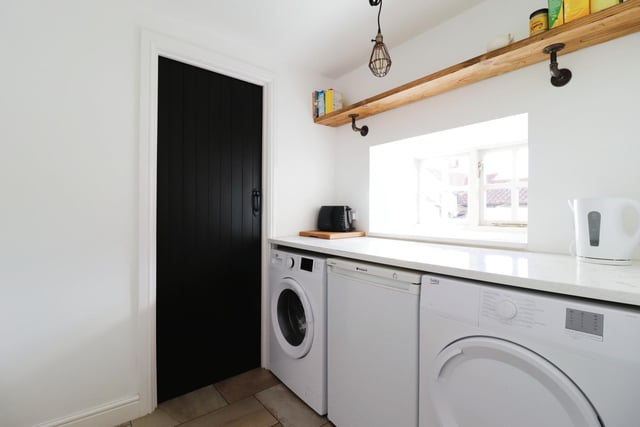 There's a useful utility room, to add to facilities within the kitchen.