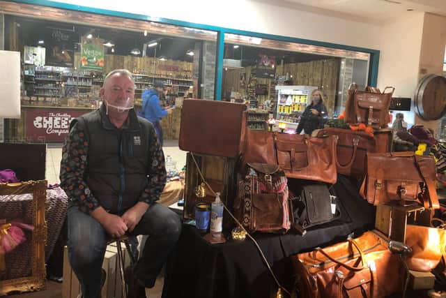 Independent business Karma, sells camel leather bags.