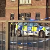 Police and cordons are in place at the scene in Trafford Way.