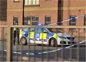 Police and cordons are in place at the scene in Trafford Way.