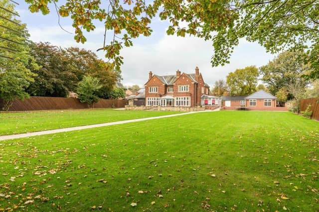 Looking towards the £1.25m home from its lawned gardens.