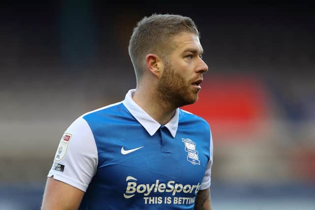Adam Clayton has signed an 18-month deal with Rovers