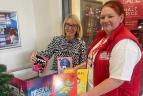 Abby Chandler of Lakeside Village with Paula Clayton, Cash for Kids Mission Christmas Co-ordinator.