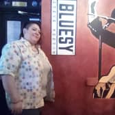 Kath Thorpe, co-owner of The Queen pub in Doncaster, with the new mural of Steve Keeton, who died after suffering from Covid-19