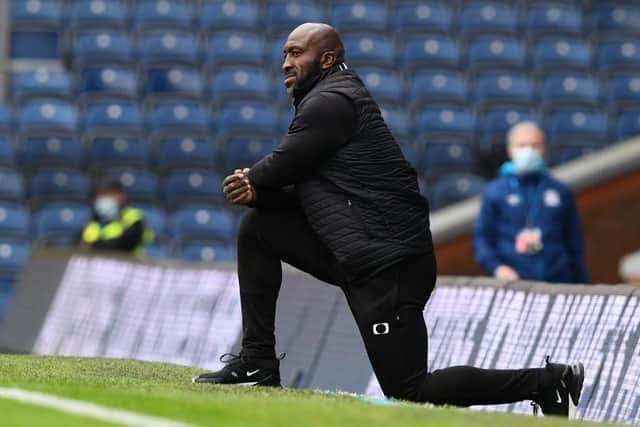 Darren Moore takes the knee prior to the clash with Blackburn Rovers. Picture: Howard Roe