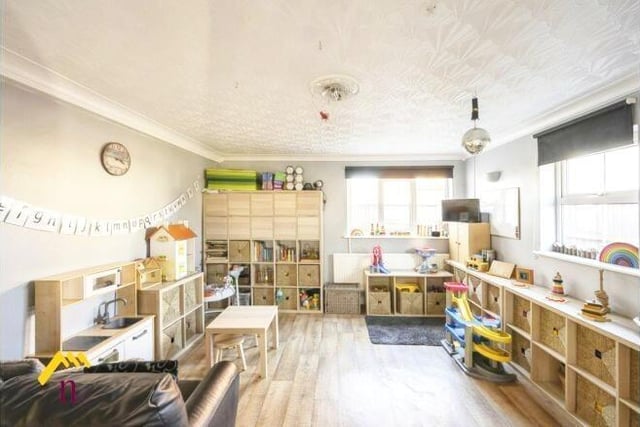 A versatile room currently used as a playspace.