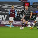 Brad Halliday passes into Fejiri Okenabirhie against West Ham United. Picture: Gareth Williams/AHPIX