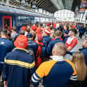 Fans getting ready to board the direct Hull Trains service to London.
