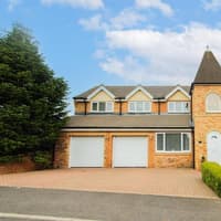 Inside swish village home with luxury air-conditioned bedroom suite