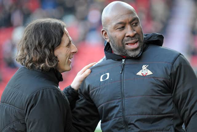 Doncaster Rovers boss Darren Moore with Wycombe Wanderers manager Gareth Ainsworth.