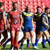 Doncaster's players celebrate Misi Taulapapa's try against Keighley. Picture: Howard Roe/AHPIX.com