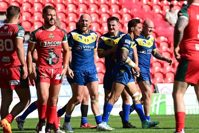 Doncaster's players celebrate Misi Taulapapa's try against Keighley. Picture: Howard Roe/AHPIX.com