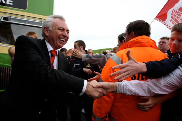 John Ryan meets and shakes hands with fans