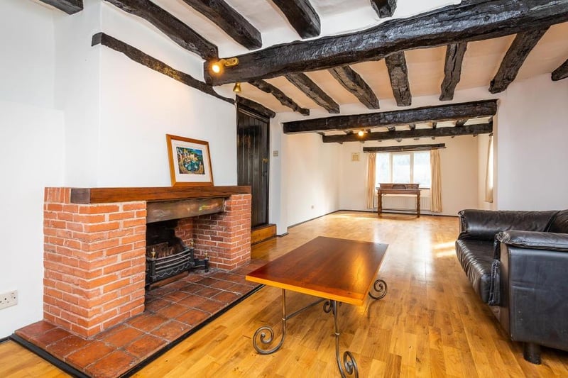 The character interior, with open fireplaces, attracts plenty of natural light.