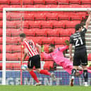 Charlie Wyke heads in again for Sunderland against Rovers. Picture: Howard Roe/AHPIX