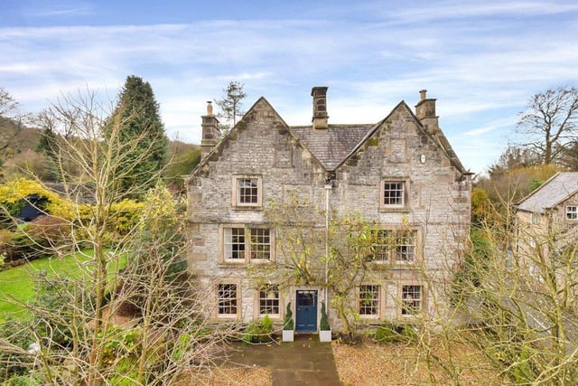 The Dower House is set behind stone walls and is approached via a pair of timber gates, featuring decorative wrought iron-work, hung between tall gate pillars with carved designs. The gates open into the courtyard with a flagstone path leading to the front door and space to park about four cars.