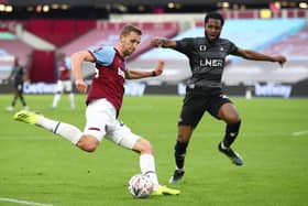 Cameron John in action against West Ham United last season. Photo: JULIAN FINNEY/POOL/AFP via Getty Images