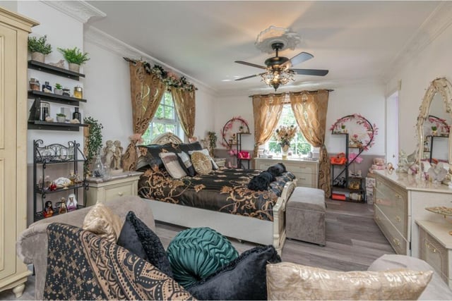 This exceptional home has three receptions, a garden room, summerhouse ...