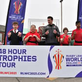 Children from the Doncaster School for the Deaf with the three RLWC2021 trophies during their event in the 48-hour Trophies Tour - credit SWPix