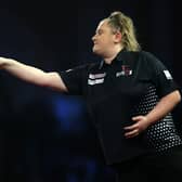 Beau Greaves in action at the Cazoo World Darts Championship at Alexandra Palace on December 16, 2022 in London, England (photo by Luke Walker/Getty Images).