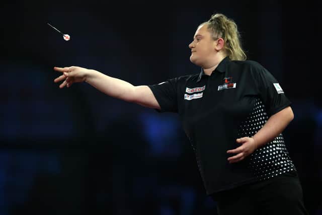 Beau Greaves in action at the Cazoo World Darts Championship at Alexandra Palace on December 16, 2022 in London, England (photo by Luke Walker/Getty Images).