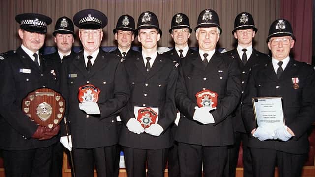 The South Yorkshire Police held its Special Constabulary annual review at the Dupont Social Club, Doncaster, on November 30, 1997. Our picture shows, from left, District Officer, Doncaster, Philip Armstrong; PC Sam Ramsden; Special Constable Sam Coulter; Police Sgt Richard Barnes; Special Constable Andrew Kendall; Section Officer Roy Curran, who accepted an award on behalf of Denis Reed; PC David McEwan; Acting Section Officer Shane Marsh; and Section Officer Lawrence Millsom.