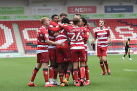 Rovers celebrate as Taylor Richards scores their third goal against Bristol Rovers. Picture: Howard Roe/AHPIX