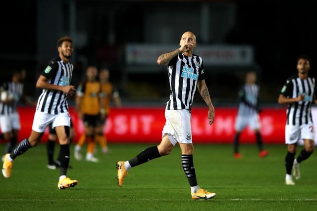 Jonjo Shelvey celebrates after scoring his sides first goal during the Carabao Cup fourth round match between Newport County and Newcastle United.