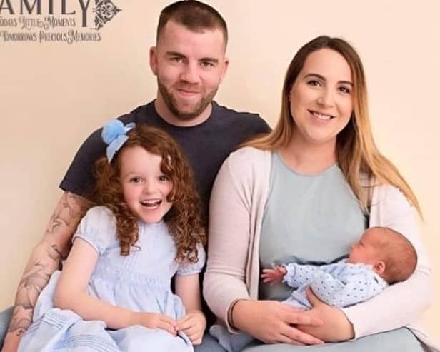 Jamie Cantrill with his partner Tanya Wilkinson and their children.