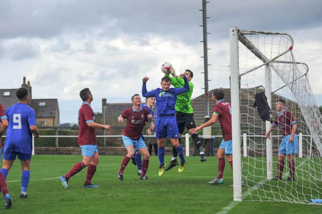 Rossington drew 3-3 at Emley AFC. Photo: Russ Sheppard/Offthebenchpics