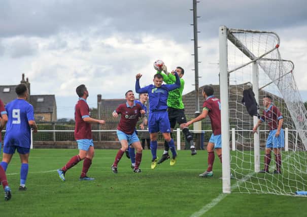 Rossington drew 3-3 at Emley AFC. Photo: Russ Sheppard/Offthebenchpics