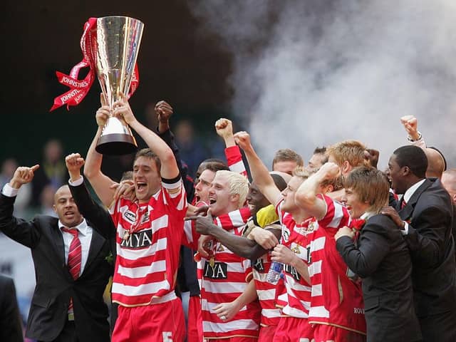 Captain Graeme Lee lifts the Trophy as his Doncaster Rovers team-mates celebrate after the Johnstones Paint Trophy Final win over Bristol Rovers at the Millennium Stadium on April 1, 2007 .