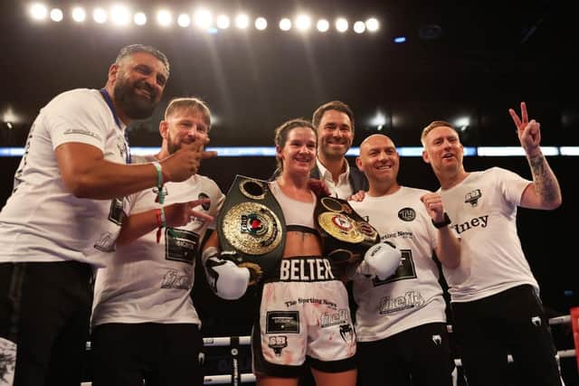 Terri Harper poses with her team and Eddie Hearn after defeating Hannah Rankin. Photo: Nathan Stirk/Getty Images