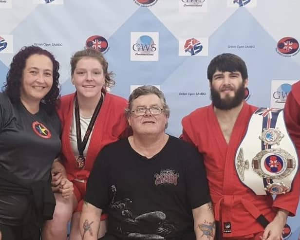 The three Doncaster medalists (in red robes) after their success at the British Sport Sambo Championships