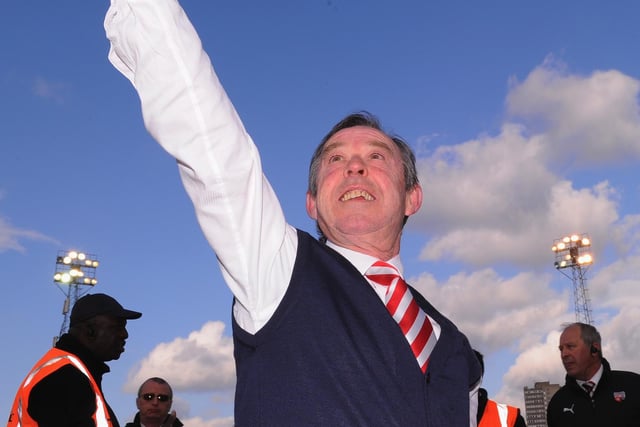 Doncaster manager Brian Flynn salutes the Doncaster fans after gaining promotion (photo by Mike Hewitt/Getty Images).