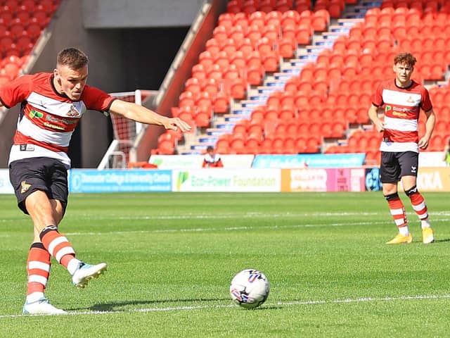 Doncaster Rovers' Owen Bailey demonstrates the attacking side of his game.