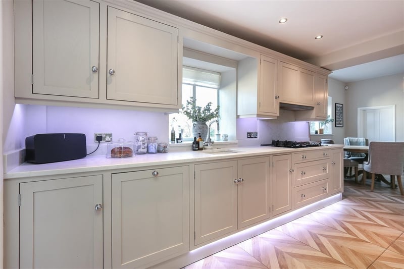 Modern dining kitchen with solid marble worktops.