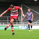 Doncaster's Joe Ironside levels the scores.