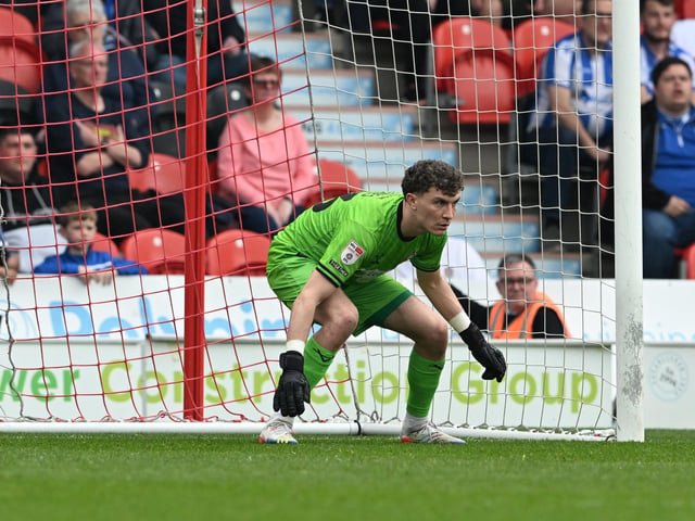Made a superb stop to deny Matty Stevens from point-blank range in the first half and another great stop after the break when another effort took a wicked deflection.