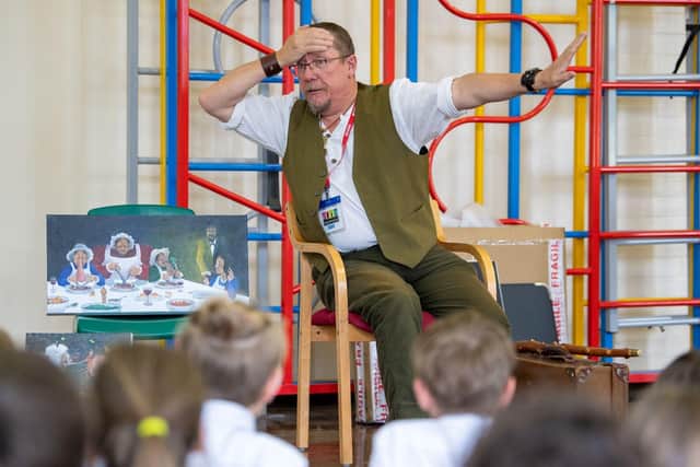Storyteller Mark Fraser telling a tale to the pupils